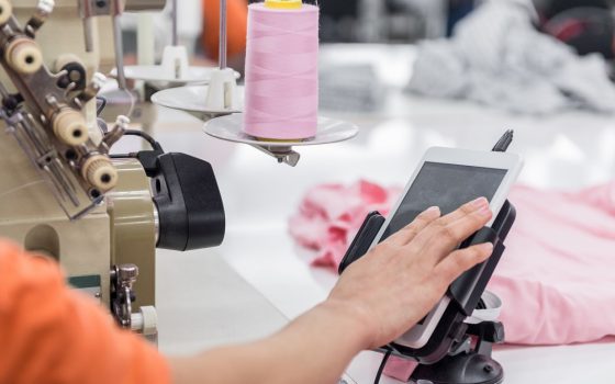 clothes for sewing machine and controls the tablet.