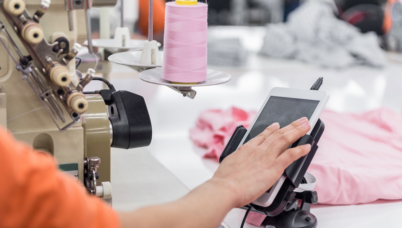 clothes for sewing machine and controls the tablet.
