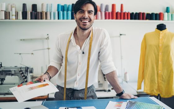 Male fashion designer working in the studio
